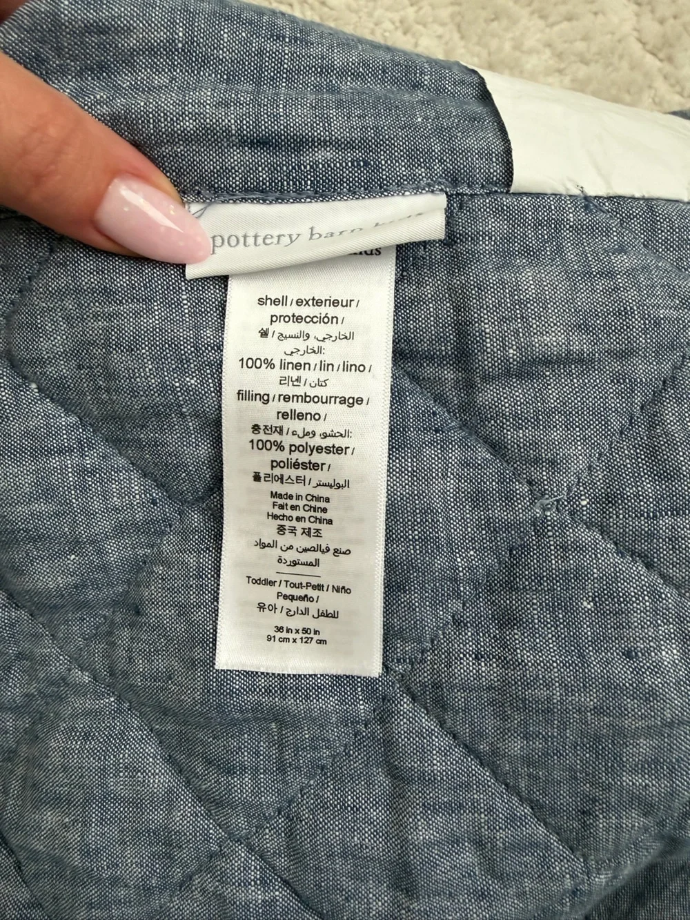 Pottery Barn Kids European linen quilt and fitted crib sheet set